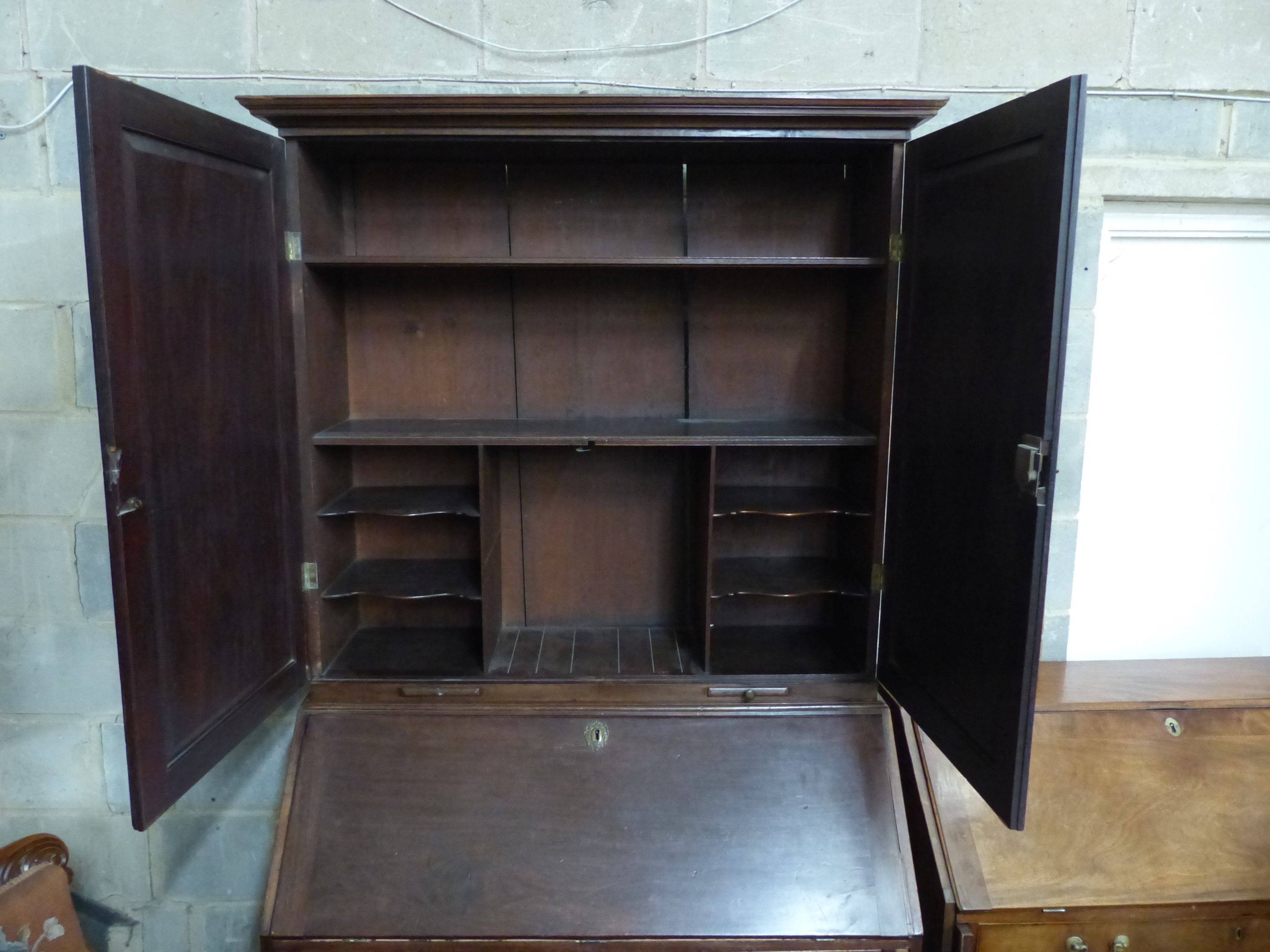 A George III mahogany bureau cabinet, length 111cm, depth 58cm, height 217cm